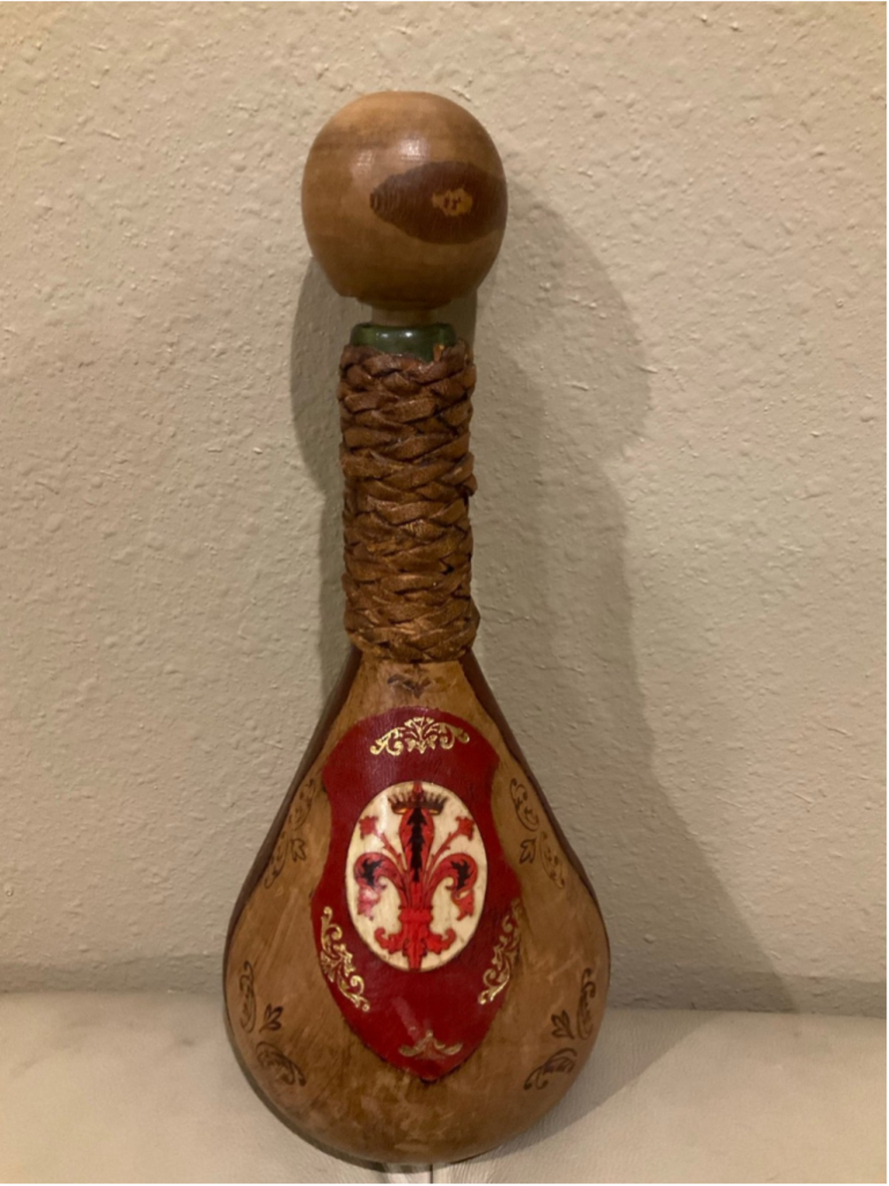 Vintage Italian leather-wrapped liquor decanter Florentine fleur-de-lis